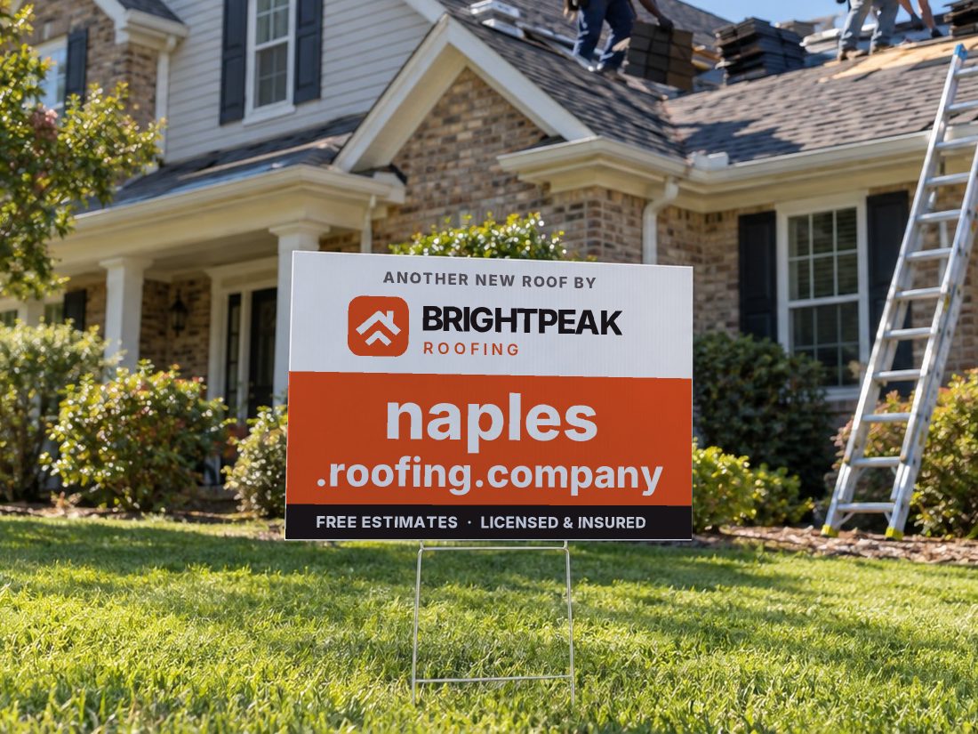 naples.roofing.company on a yard sign in front of a house getting a new roof
